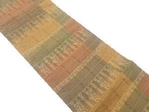 小池織物製　ふくれ織変わり横段に古代人物模様織出し全通袋帯